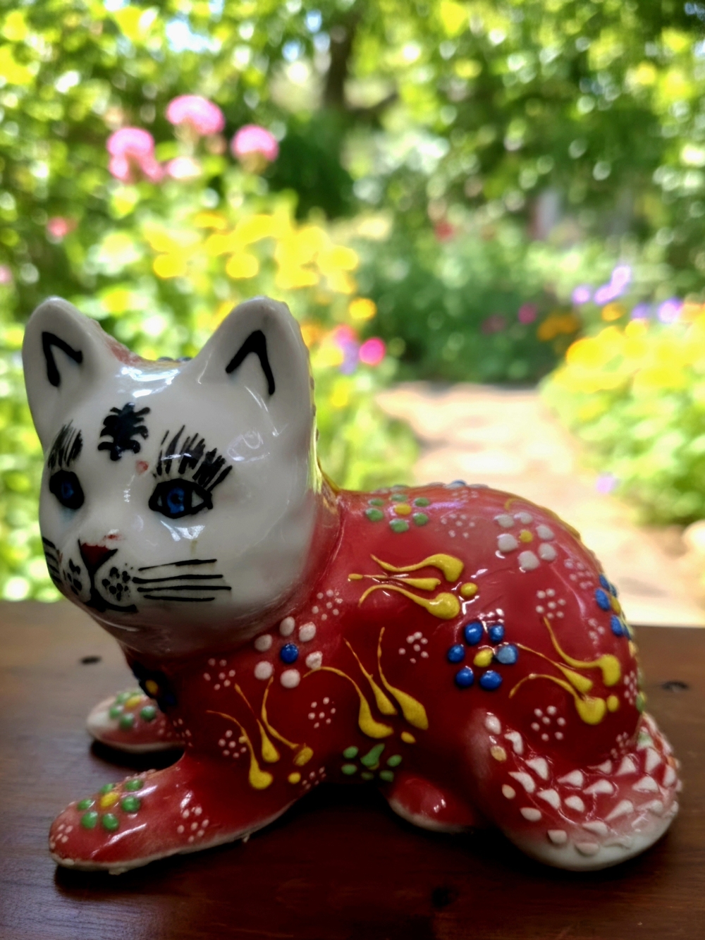 Vintage Hand-painted Turkish pottery Cat decorated with vibrant red floral Art
